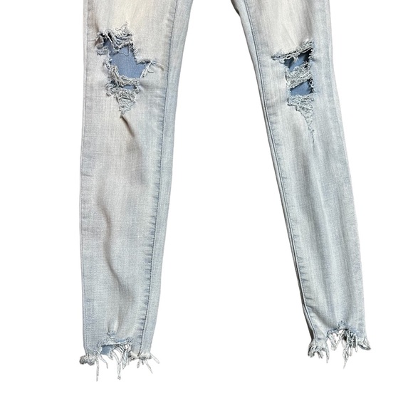 So ultimate curvy high rise jegging size 0. Light wash distressed jeans - Picture 2 of 7